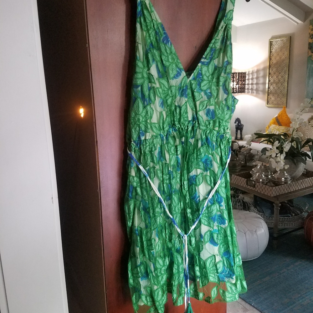 Kelly green tank top with hundred percent cotton l